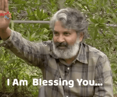 Bearded Man Waving Saying I Am Blessing You GIF