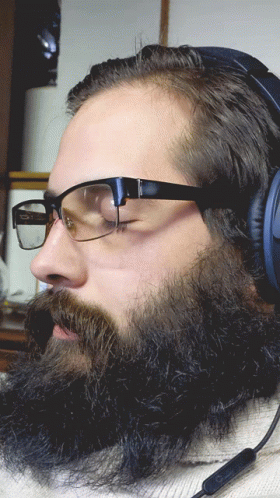 Bearded Man Wearing Glasses And Headphones GIF