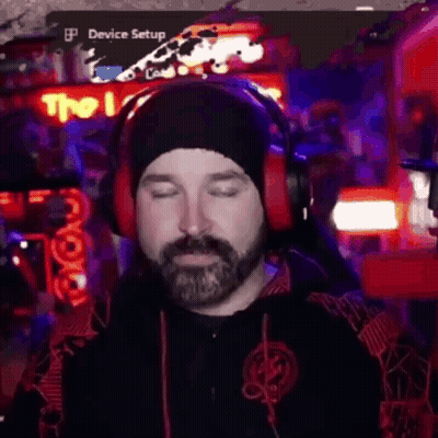 Bearded Man Wearing Headphones And Beanie Playing Video Game GIF