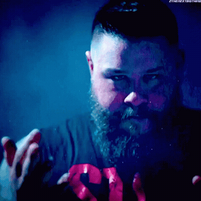 Bearded Man Wearing The Next Thing Shirt GIF