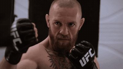 Bearded Man Wearing UFC Boxing Gloves GIF