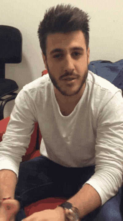 Bearded Man Wearing Watch And White Shirt GIF