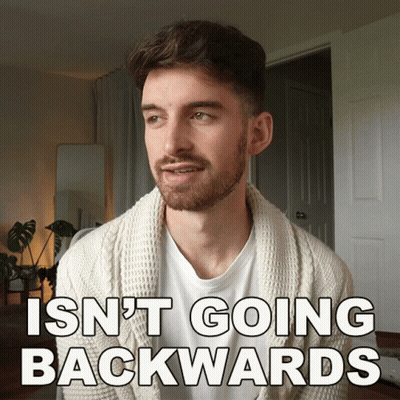 Bearded Man White Sweater Isn't Going Backwards GIF