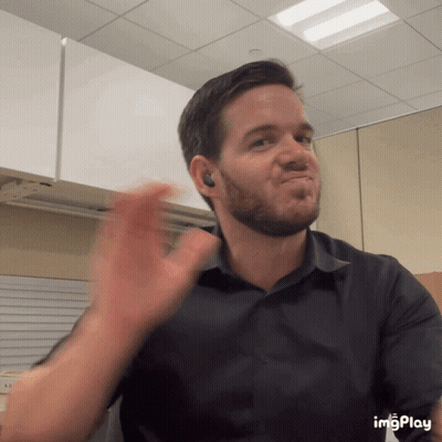 Bearded Man With Ear Buds Making Funny Face Imgplay GIF