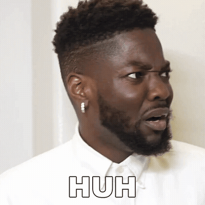 Bearded Man With Earrings And White Shirt Saying Huh GIF