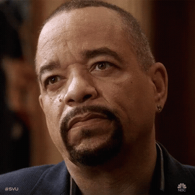 Bearded Man With Earrings Looking Up GIF