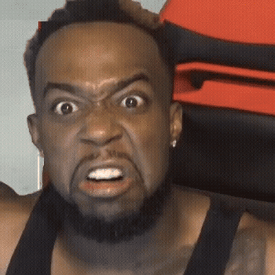 Bearded Man With Earrings Making Funny Face GIF