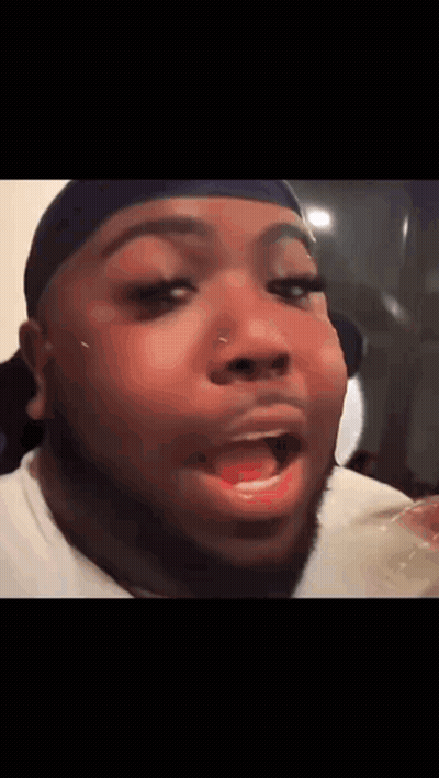 Bearded Man With Funny Face Holding Glass Of Water GIF