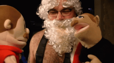 Bearded Man With Glasses And Stuffed Animals GIF