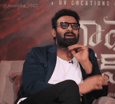 Bearded Man With Glasses And UV Creations Sign GIF