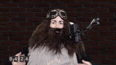 Bearded Man With Goggles At Microphone Clock 04:24 GIF