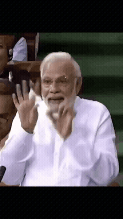 Bearded Man With Hands Up Making Funny Face GIF
