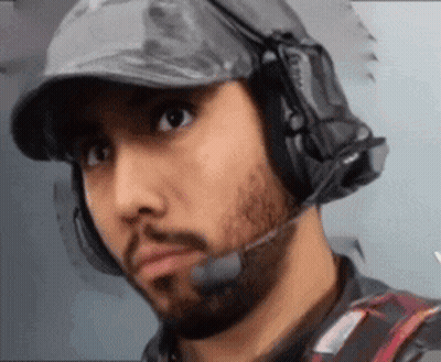 Bearded Man With Hat Headphones and Microphone