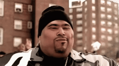 Bearded Man With Hat In Front Of City Street GIF