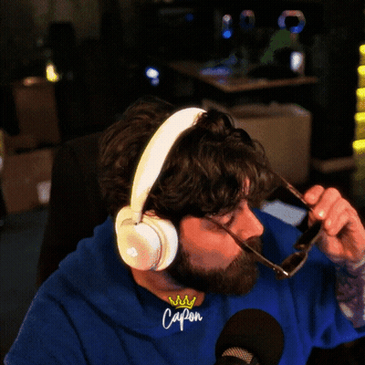 Bearded Man With Headphones And Cap On Shirt GIF