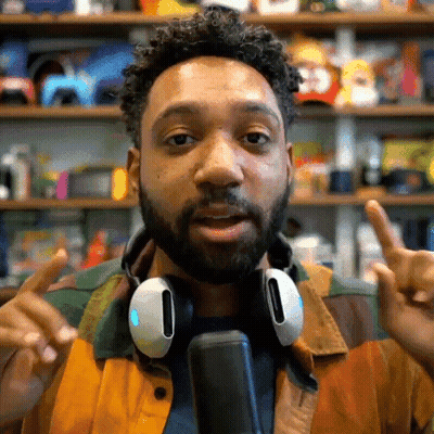 Bearded Man With Headphones And Colorful Jacket GIF