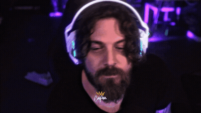 Bearded Man With Headphones And Crown Saying Cajun GIF