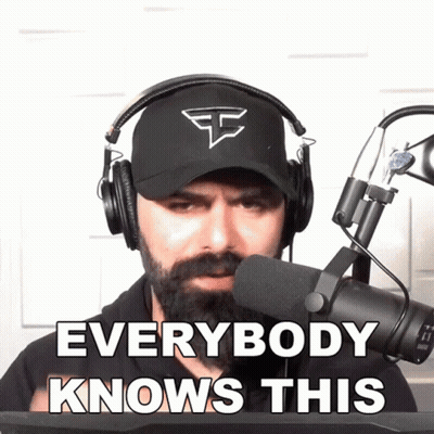 Bearded Man With Headphones and Hat Says Everybody Knows This