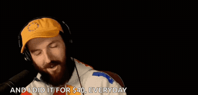 Bearded Man With Headphones And Yellow Hat Talking Into Microphone GIF