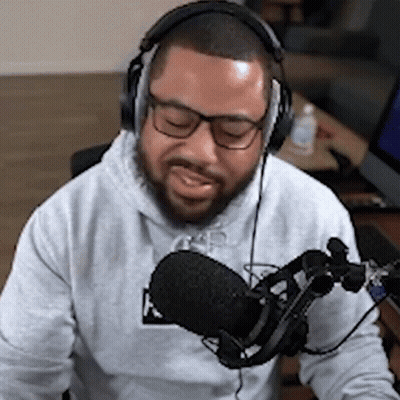 Bearded Man With Headphones At Microphone GIF