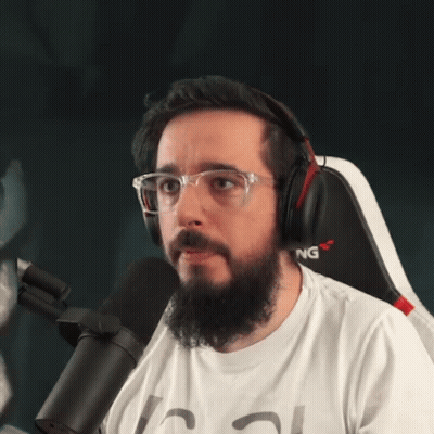 Bearded Man With Headphones Glasses In Gaming Chair GIF