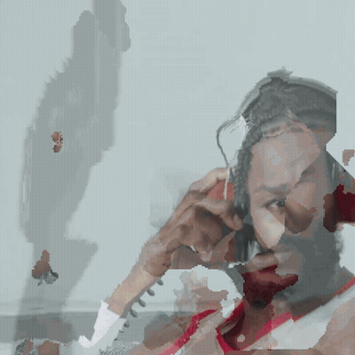 Bearded Man With Headphones Looking At Camera GIF