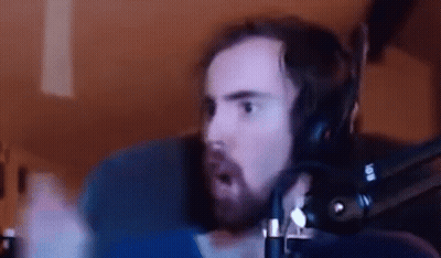 Bearded Man With Headphones Making Funny Face At Microphone