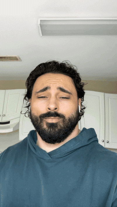 Bearded Man With Headphones Sad Face GIF