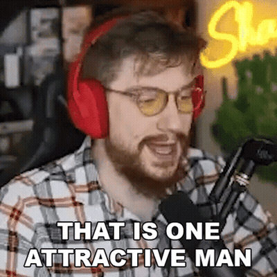 Bearded Man With Headphones Talking Into Microphone GIF