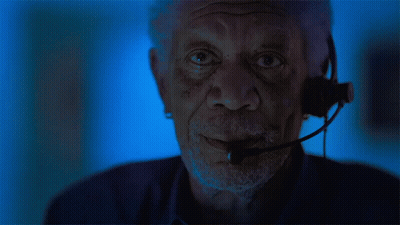 Bearded Man With Headset Looking At Camera GIF