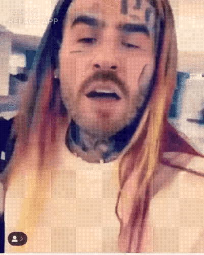 Bearded Man With Long Hair And Face Tattoo GIF