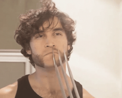 Bearded Man With Metal Claws GIF