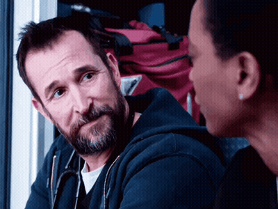 Bearded Man With Stethoscope Talking To Woman GIF