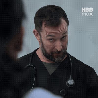 Bearded Man With Stethoscope Talking To Woman In HBO Max Ad GIF