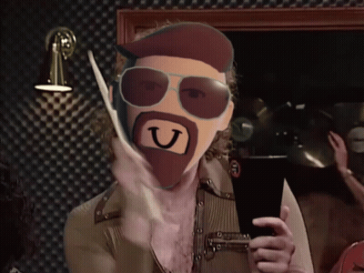 Bearded Man With Sunglasses Holding Letter U In Mouth GIF