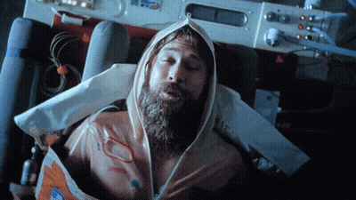 Bearded Man Wrapped In USA Logo Plastic Bag GIF