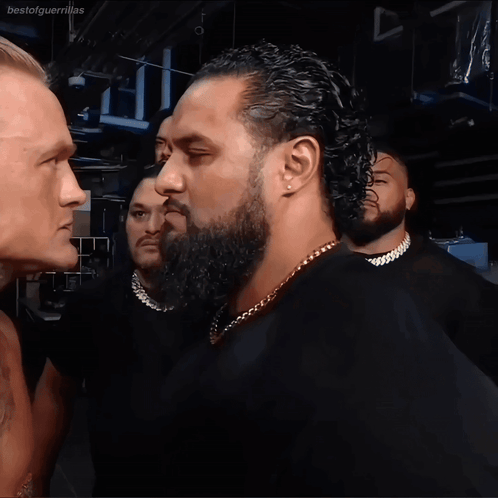 Bearded Men Looking At Each Other GIF