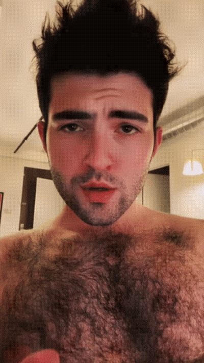 Bearded Shirtless Man Looking At Camera GIF