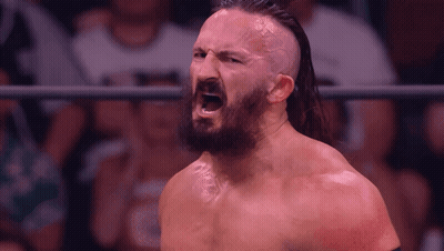 Bearded Wrestler Screaming In Front Of Crowd GIF