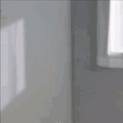 Beautiful Girl Peep To Wave Hello GIF