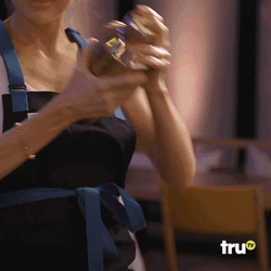 Beautiful Lady Bartender Mixing Drinks GIF