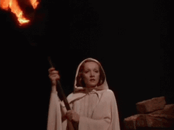 Beautiful Marlene Dietrich Holding A Torch