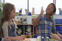 Beck Bennet Talking To Shaking Young Boy GIF