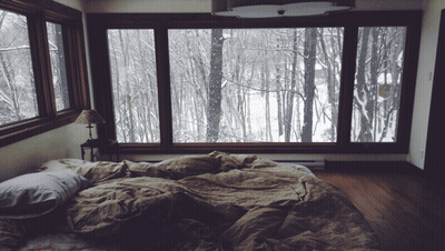 Bedroom With Bed And Large Window GIF
