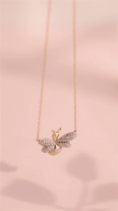 Bee Shaped Pendant Necklace Pink Background GIF