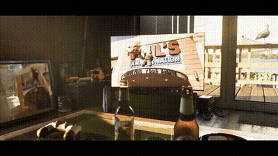 Beer Bottle In Front Of U.S. Air Force Sign GIF