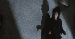 Beetlejuice Scaring A Woman GIF