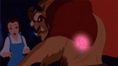 Belle And The Beast From Beauty And The Beast Are Looking At A Pink Heart GIF