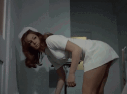Bend Over Sexy Nurse Reaching Down GIF