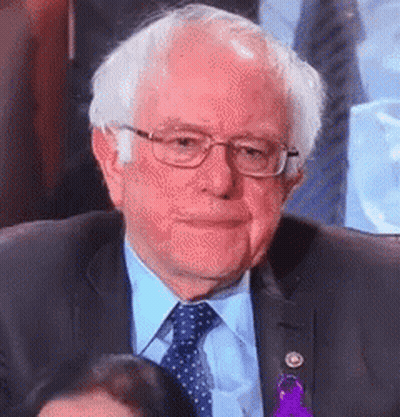 Bernie Sanders Is Wearing Glasses And A Suit And Tie . GIF